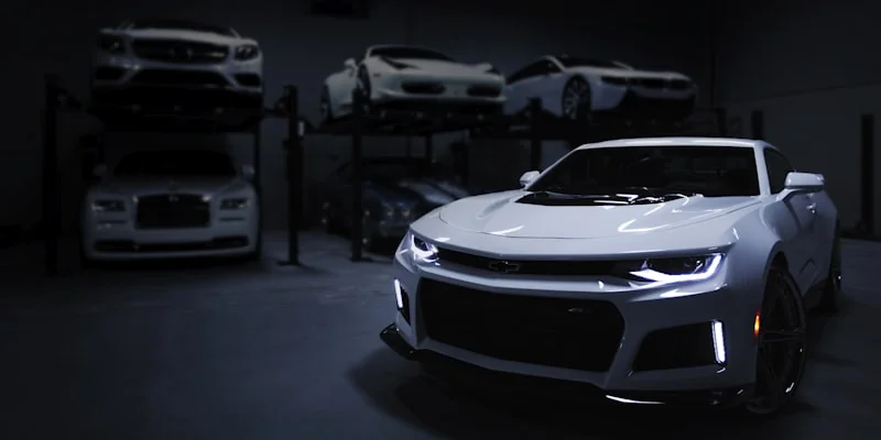 Luxury car workshop with multi-vehicle lifts — FixHive Garage DIP Dubai