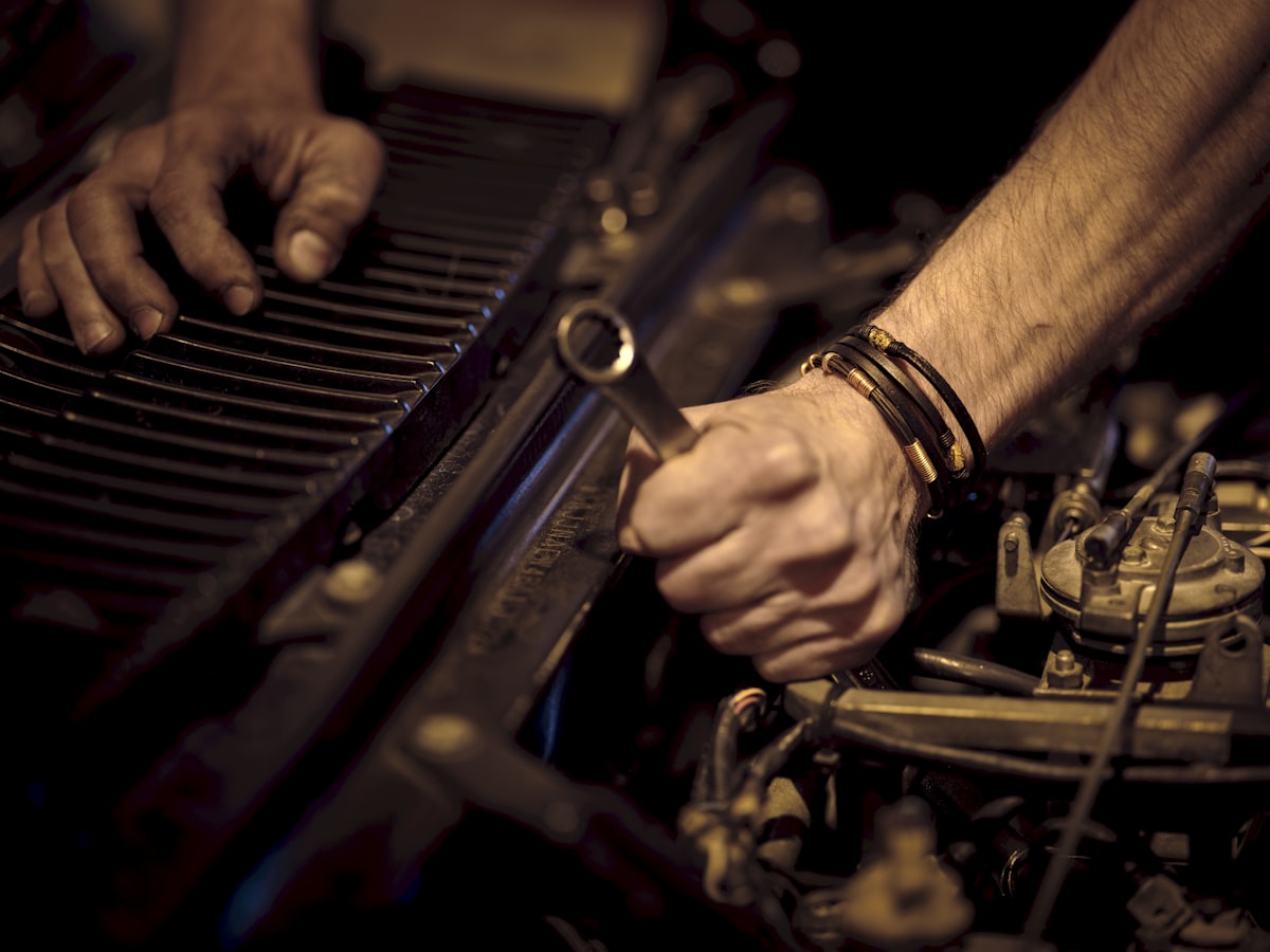 FixHive certified technician working on a car in Dubai